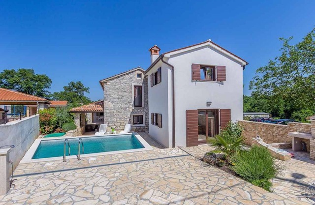 Maison de vacances avec piscine dans quartier calme