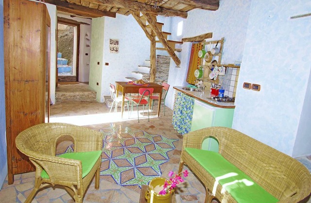 Maison de vacances dans la charmante vieille ville de Belmonte Calabro avec vue sur la mer