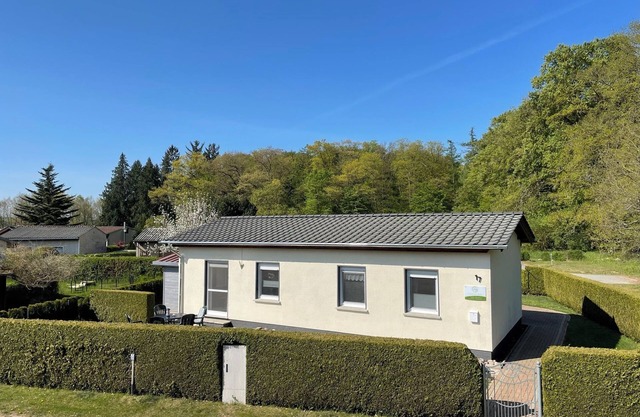Maison de vacances pour des motifs distincts directement dans le parc de la nature Suisse Mecklembourg