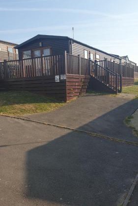 Holiday Lodge, sleeps 4, with sea & countryside views