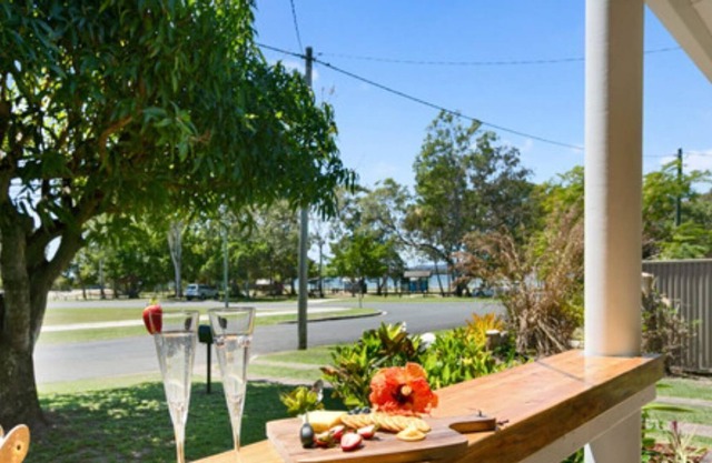 Holiday in Hamptons Style in this beautifully renovated home with views!