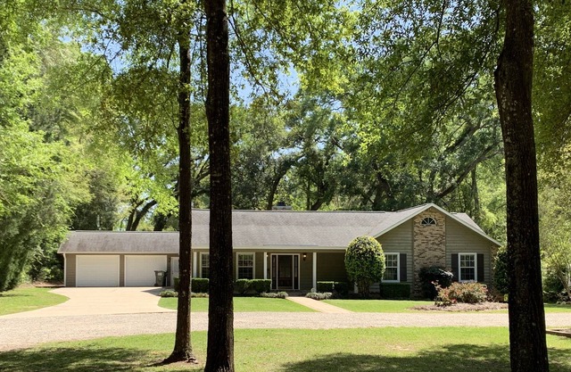 "Home" with private pool under grand grand live oaks