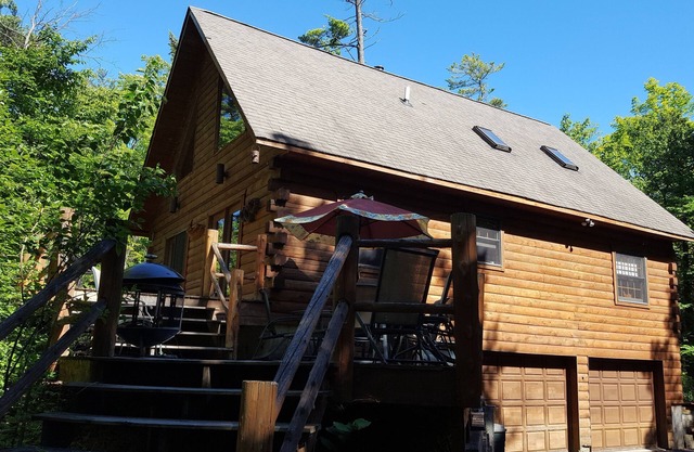 Maison propriétaire Custom Log Cabin