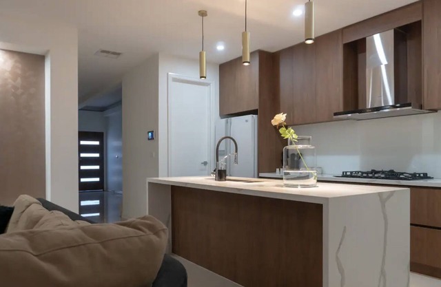 Homely Getaway with Major Movie Apps 65" Smart TV