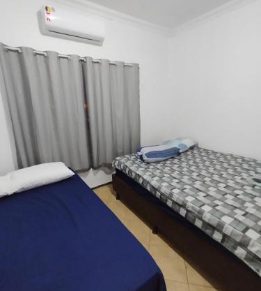 Hotel Indi quarto com banheiro externo