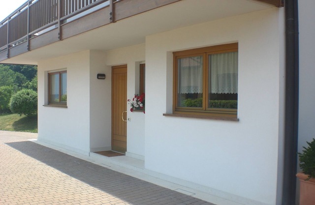 MAISON HUELLER APPARTEMENT DANS UN QUARTIER CALME AVEC GRAND JARDIN