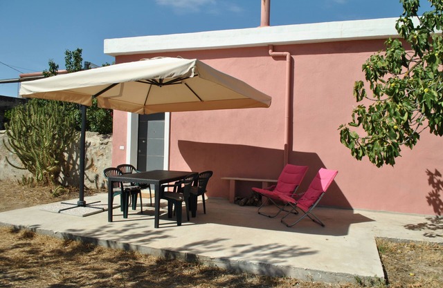 Maison à Azienda Agricola a Villacidro en Sardaigne au milieu d'orangers et d'oliviers centenaires.