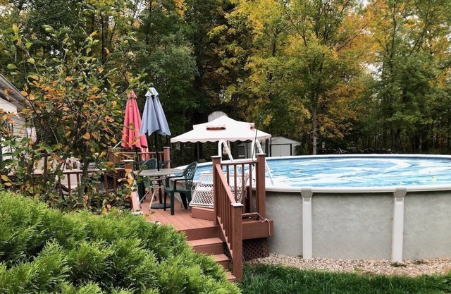 House on private lake with a pool