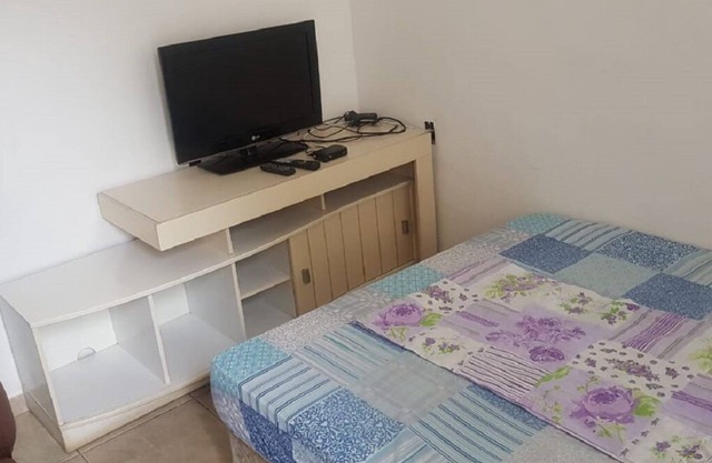 maison avec 2 chambres, salle de bains, aire de service et garage