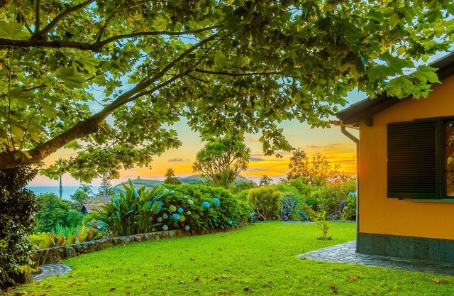 House with garden and sea views