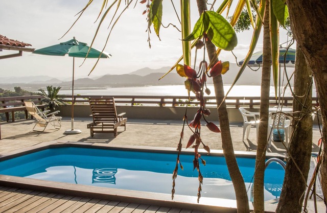 Maison dans une communauté fermée avec piscine et vue imprenable sur la lagune de Garopaba