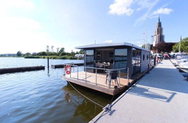Houseboat Fjord Aries with roof terrace in Schleswig