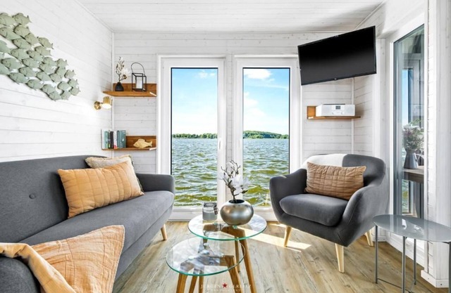 Houseboat moments of happiness for 4 people with roof terrace on the Baltic Sea fjord Schlei