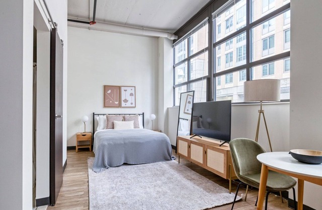 Ideal East Cambridge studio w/ W/D & Gym, steps from Train, by Blueground