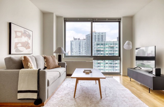 Ideal LIC 1BR w/ W/D, Elevator & Doorman, near East River, by Blueground