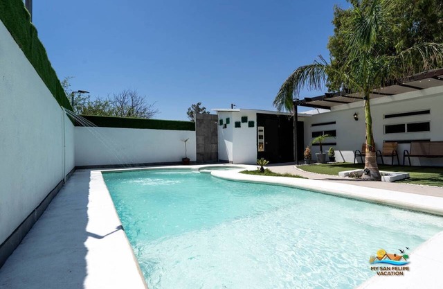 Incredible in-town pool house with BBQ area!