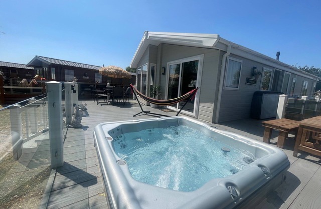 Indulgence Lakeside Lodge i1 is prime location with private fishing peg and hot tub at Tattershall