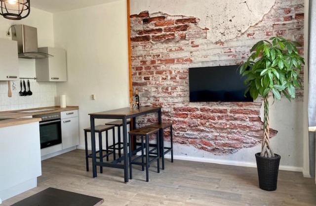 Industry - Appartement mit Balkon