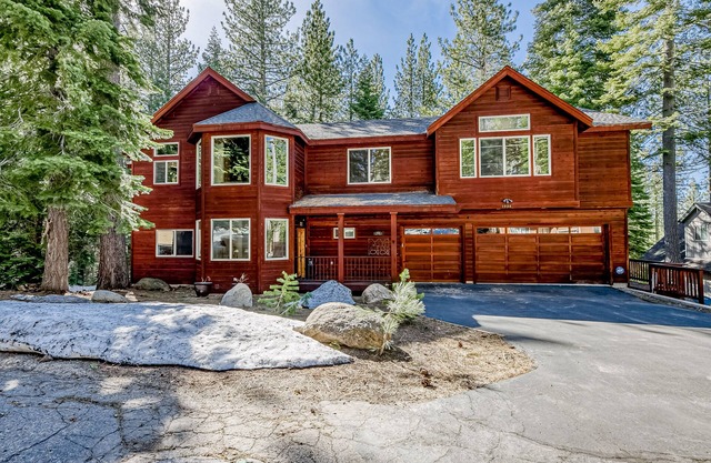 Inviting spacious home with fireplace, deck, hot tub, full kitchen, & W/D