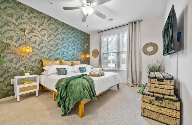 Jungle on the Square – Exotic 1BR w/ Rooftop Lounge, Pool & Gym Access