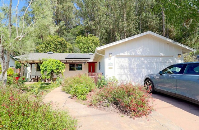 Just one mile from the beach, you'll find our charming and modern 3BR, 2BA house...