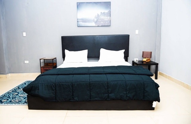 King Studio Suite with kitchen and Sofa.