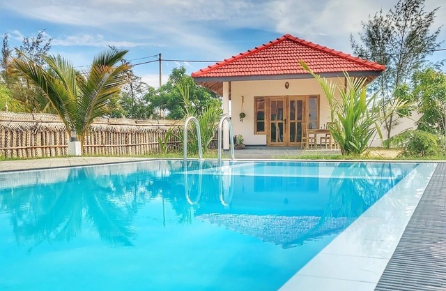 Komfortables Doppelzimmer mit Pool, Wifi und Kühlschrank mit Strandzugang