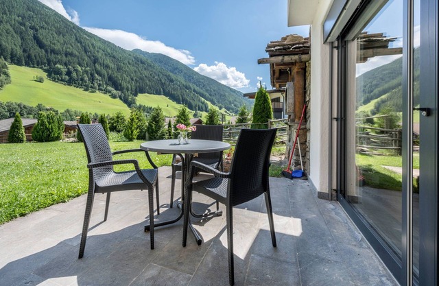 Appartement AlpenAppart App Kreuzkofel avec bain à remous et jardin partagés