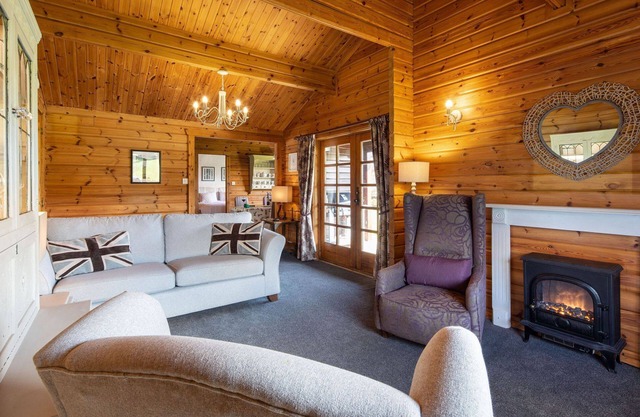 Lapwing Luxury Log Cabin, bain à remous privé et vue sur la montagne dans le parc national