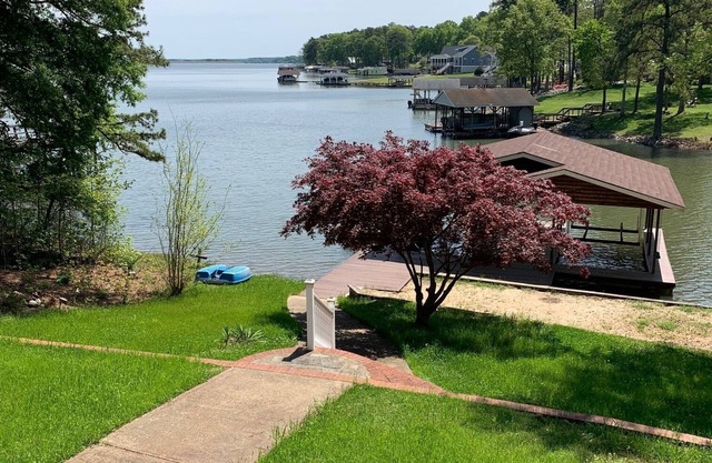 Beautiful Waterfront Retreat w/3 Living spaces w/3 full Kitchens & a sandy beach