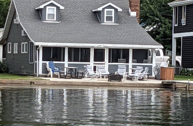 Lake front cottage recently remodeled w/ private dock and optional pontoon boat.