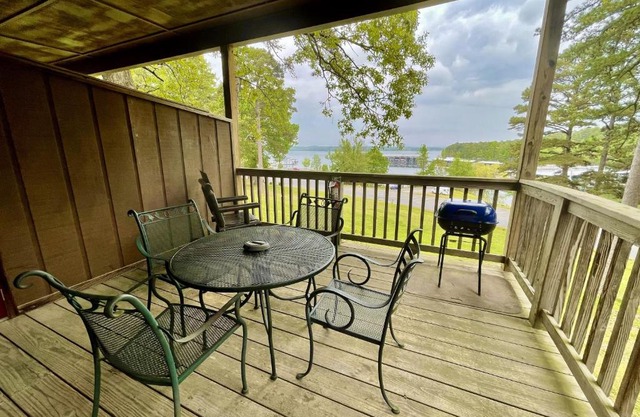 Lake view queen guest room with two queens, sleeper sofa and patio overlooking Lake Ouachita, Hotel Room