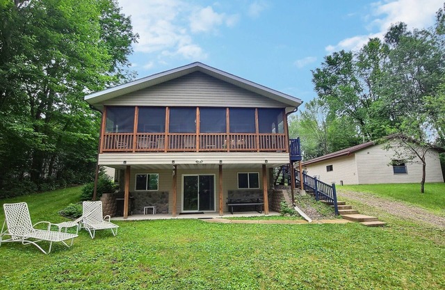 Beautiful Lakefront Home On Large Wooded Lot.