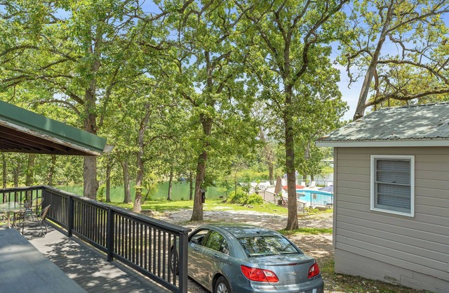 Lakefront 2BR Cabin w/ Pool + Swim & Boat dock
