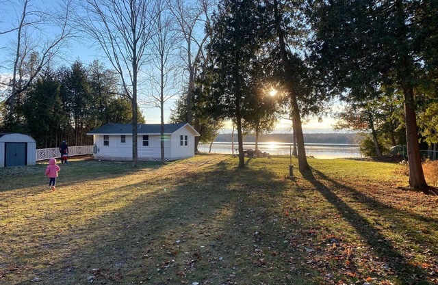 Lakefront Cottage Retreat w/ Private Dock, Paddle Boards, Fire Pit, Sunset Views