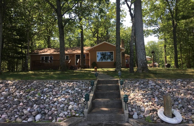 Beautiful lakefront home on large quiet lot on an all sports lake.