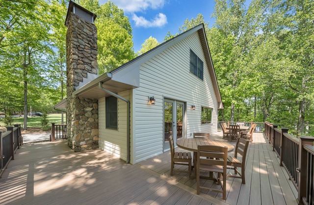 Sunrise Retreat: Lakefront Home with Hot Tub