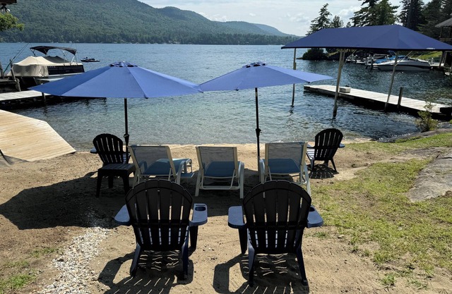 Lakefront luxury, Lake George log cabin home with your own private sandy beach