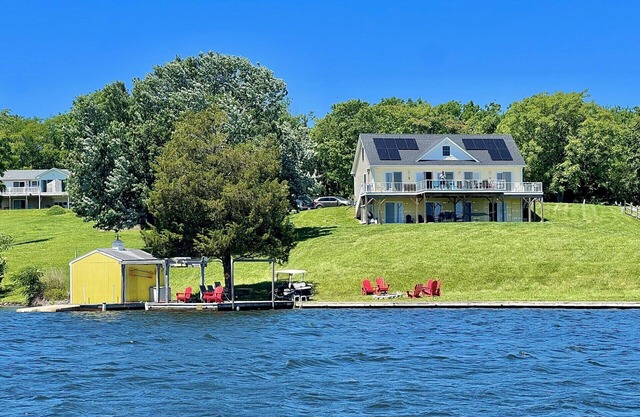 Lakefront of 240 feet on Private side. Lake and Sunrise view from every room!!!