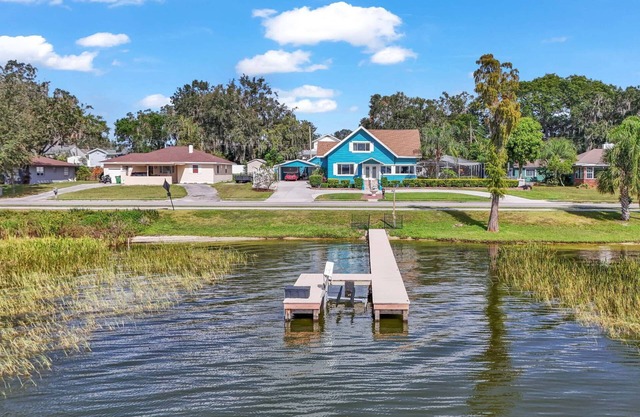Lakefront Retreat at 6BR Escape w/ Heated Pool | Private Dock | Game Room | Kayaks | Deck | Perfect