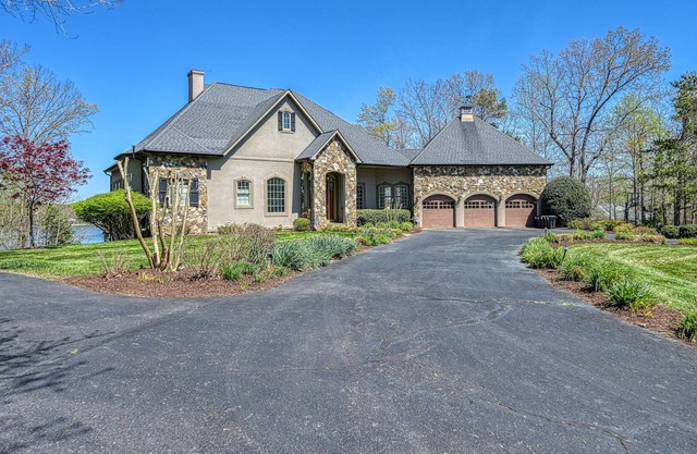 Lakefront stunner with private pool and hot tub, dock & central AC