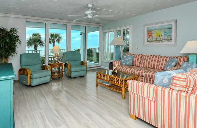 LaPlaya 201C-Breathtaking Gulf panorama from this corner end unit with a private stairway to the beach.