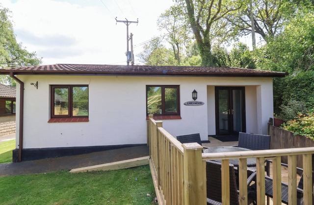 LARCHWOOD LODGE, pet friendly, with a garden in Combe Martin