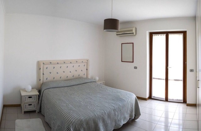 Large and elegant two-bedroom apartment in residence with pool