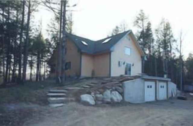 grande maison de style chalet sur le lac du sebec