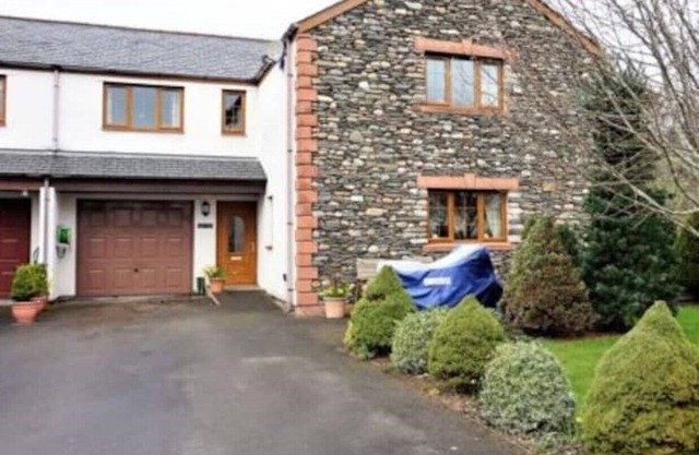 Large modern house in small rural Hamlet.