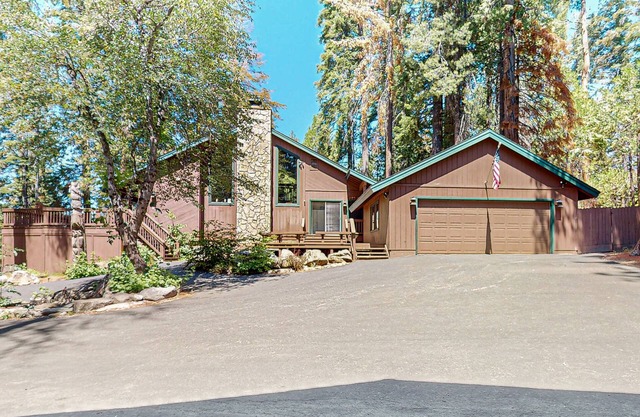 Large mountain-view home with guest house, fireplace, game room, & fire pit
