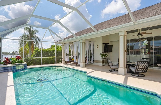 Latitude Adjustment - A Gorgeous Riverfront Home in the Quiet Fort Myers Shores Area