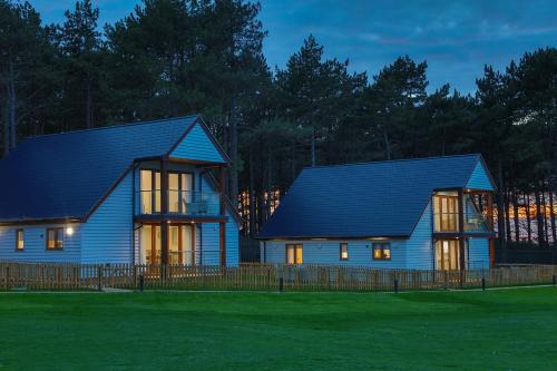 Le Strange Arms Garden Lodges