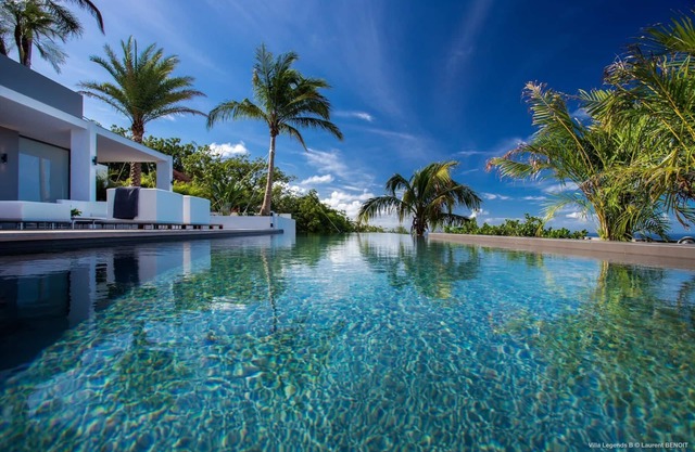 Villa luxueuse avec cinq chambres, décorée sur le thème des cinq marques de luxe, piscine chauffée de 14 pieds de long